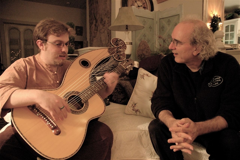 john doan harp guitar retreat nick receives pointers from John Doan