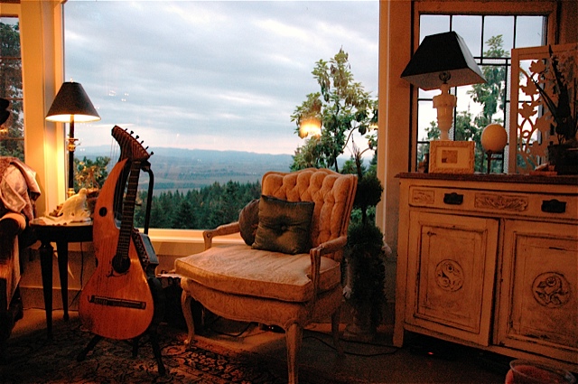 John Doan - living room concert - the chair awaits in his home.