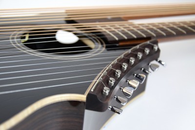 Brunner Harp Guitar from the Super Treble side revealing the upper sound port through the sound hole.