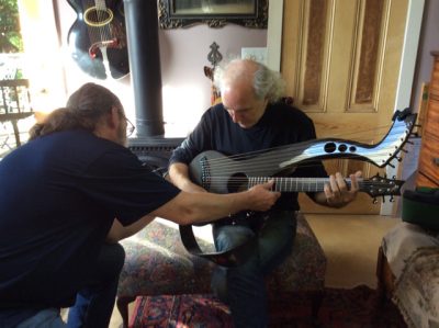 3. Gerry Camp shows John Doan Emerald Harp Guitar