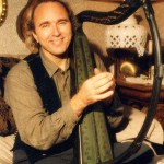 John Doan with a celtic harp