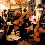 John Doan Harp Guitar Retreat John Doan working with participants on harp guitars