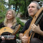 john doan and murial anderson harp guitars in garden