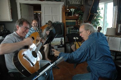 john doan harp guitar retreat john holds guitar over head of student threateningly