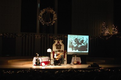 John Doan on stage with the Christmas show.
